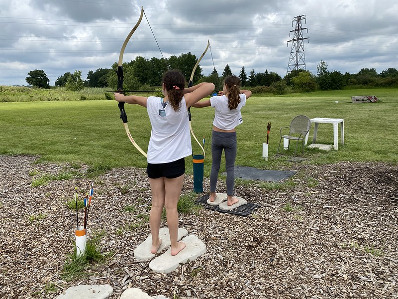 barefoot Children using recurve bows at Barefoot Bushcraft in Fonthill, Ontario